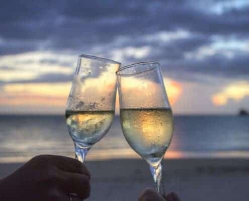 Sharing a drink by the sea